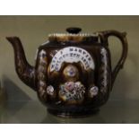 A Victorian barge ware teapot, having relief decoration of flowers and foliage, inscribed Mrs J