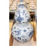 A pair of modern Chinese blue and white ceramic vases, double gourd shaped, 54cm high, (2)