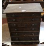 A small oak collector's cabinet of six drawersBest Bid