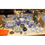 A collection of decorative ceramics and glass; to include a clear glass oil lamp, a quantity of