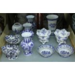 A quantity of decorative ceramics to include three matching blue and white ceramic vases, baluster