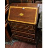 A mahogany and satin wood banded Georgian style bureau.