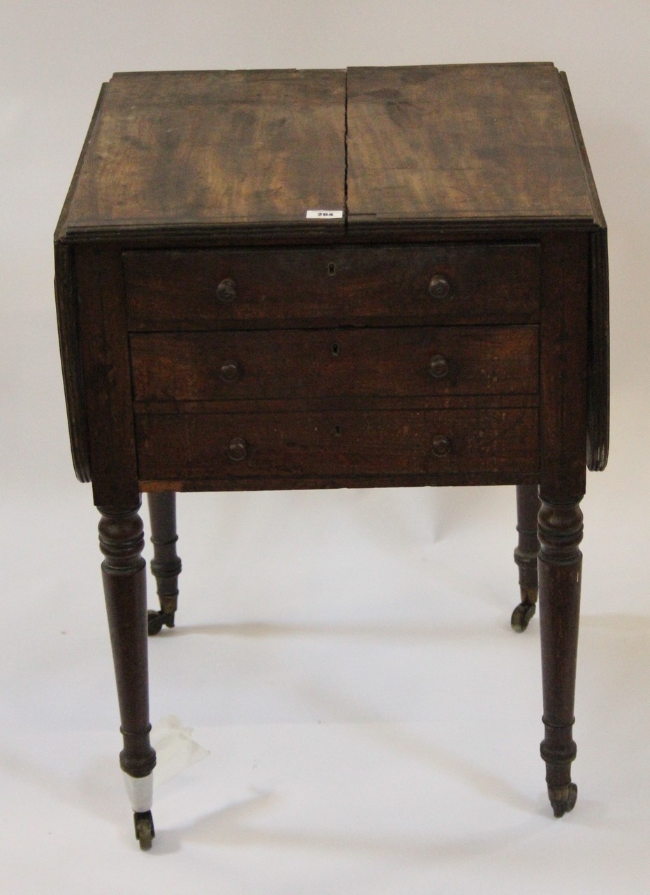 A Regency mahogany drop-leaf work table with one deep drawer and a further drawer turned legs