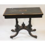 A late 19th century aesthetic design card table.