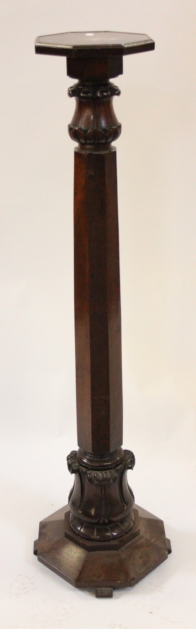 A 19th century mahogany octagonal torchereBest Bid