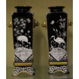 A pair of Aesthetic taste glass vases, tapering, parcel gilt with lion mask handles, painted with