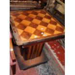 A lamp table with chequered top. Best Bid