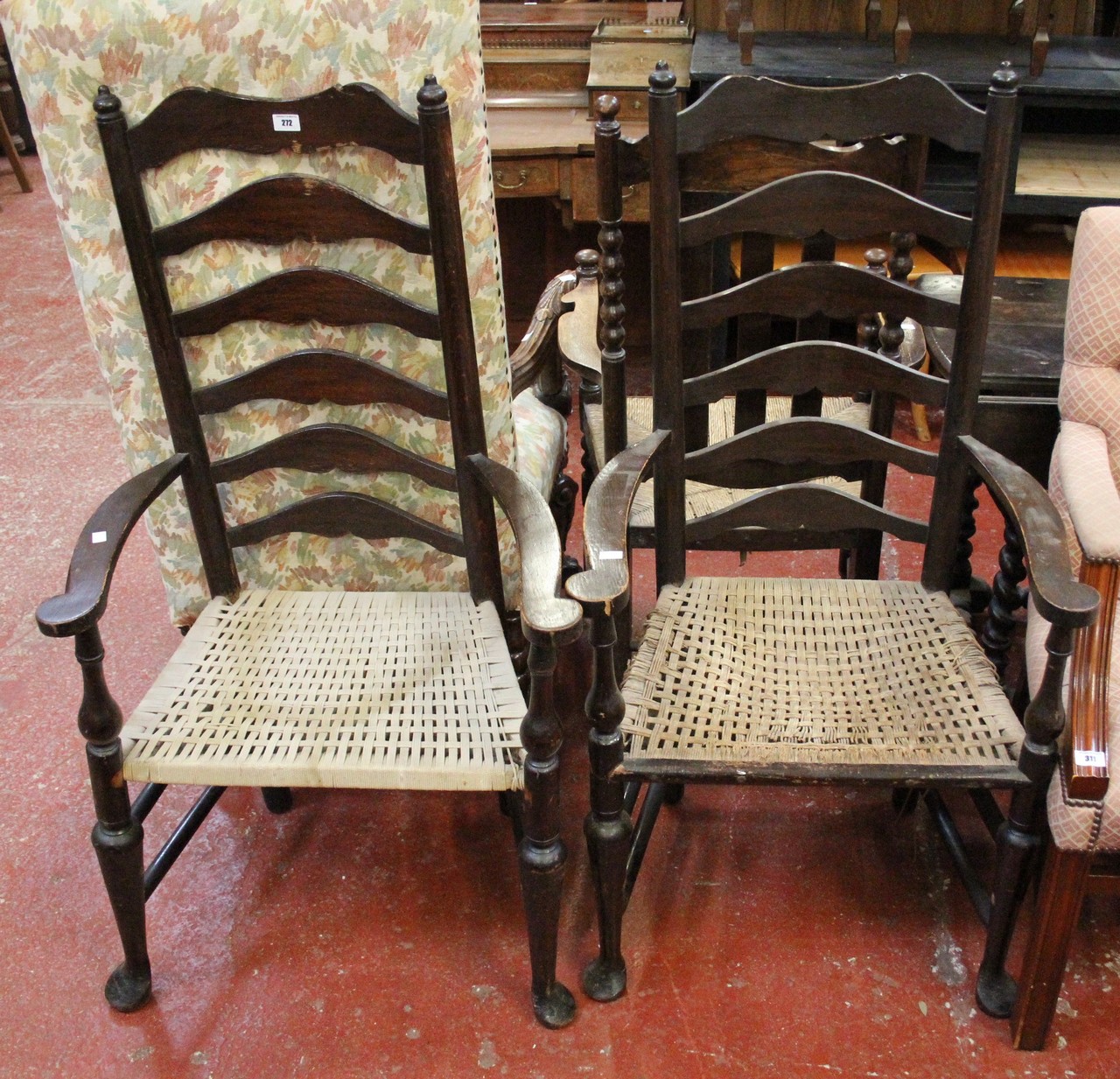 Two oak ladder back chairs with rope seats.Best Bid