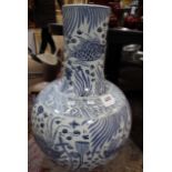 A large modern Chinese blue and white ceramic vase, ovoid shaped with elongated neck, decorated with