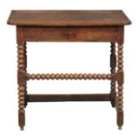 A William & Mary oak side table, circa 1690, the shaped top above single frieze drawer and bobbin