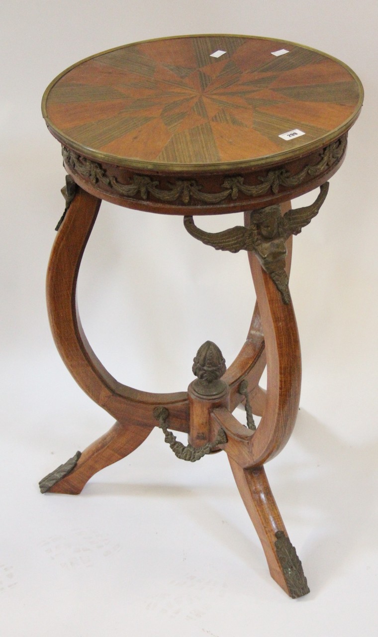 An Empire style lamp table with ormolu mounts.