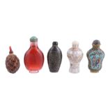 A group of five snuff bottles comprising one lac burgaute A group of five snuff bottles comprising