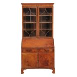 A late 19th/early 20th century satinwood bureau bookcase  A late 19th/early 20th century satinwood