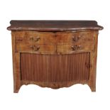 A Continental walnut serpentine fronted serving or dressing chest  A Continental walnut serpentine