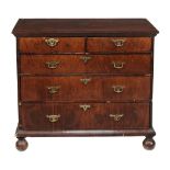 A George II walnut and line inlaid chest circa 1740 the crossbanded...  A George II walnut and