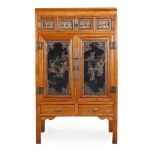 A Chinese black lacquer and gilt decorated cupboard, 20th century  A Chinese black lacquer and