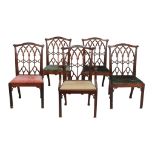 A set of four dining chairs in George III style, late 19th /early 20th century A set of four