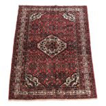 A Hamadan rug, approximately 234cm x 153cm  A Hamadan rug,   approximately  234cm x 153cm