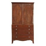 A Regency mahogany linen press, circa 1815  A Regency mahogany linen press,   circa 1815, the