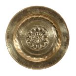 A Nuremberg brass alms dish, late 16th / early 17th century  A Nuremberg brass alms dish,   late