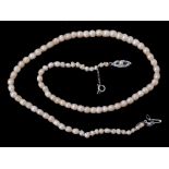 A natural pearl necklace , the ninety two graduated pearls measuring 3.3mm to 5 A natural pearl