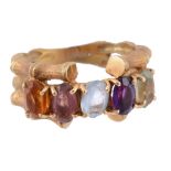 A multi gem ring, the oval cut stones including amethyst A multi gem ring, the oval cut stones