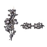 A pair of rose cut diamond brooches, the first a floral spray brooch A pair of rose cut diamond