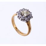 An 18 carat gold yellow diamond and diamond ring, London 2002 An 18 carat gold yellow diamond and