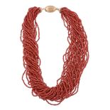 A multi strand coral necklace, the multiple strands of coral to a polished... A multi strand coral