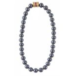 A hematite bead necklace , the thirty four uniform 10mm polished hematite... A hematite bead