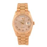 Rolex, Oyster Perpetual Day-Date, a gentleman’s 18 carat pink gold wristwatch  Rolex, Oyster