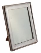 A silver rectangular photograph frame by A. & J  A silver rectangular photograph frame by A.  &