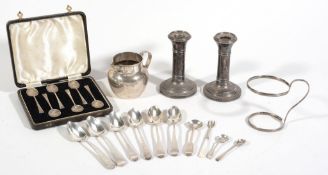 A collection of silver items, to include: a pair of Edwardian silver dwarf...  A collection of