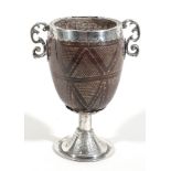 A 19th century South American silver mounted coconut cup, unmarked  A 19th century South American