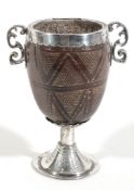 A 19th century South American silver mounted coconut cup, unmarked  A 19th century South American