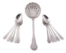 A set of ten Edwardian silver Louis XV style tea spoons by James Dixon & Sons  A set of ten