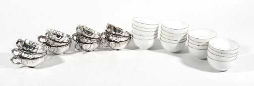 A set of twelve German silver coloured soup bowl holders by Lazarus Posen  A set of twelve German
