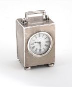 A late Victorian silver carriage timepiece, maker's mark obscured  A late Victorian silver