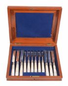 A set of six Victorian silver dessert knives and forks by Martin, Hall & Co  A set of six