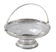 A silver swing handled cake basket by Martin Hall & Co  A silver swing handled cake basket by Martin