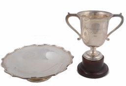 A silver shaped circular pedestal dish by Adie Bros  A silver shaped circular pedestal dish by