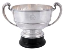 An Edwardian silver twin handled pedestal trophy cup by Atkin Bros  An Edwardian silver twin handled