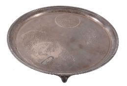 A silver circular salver by Elkington & Co  A silver circular salver by Elkington  &  Co.,