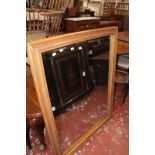 A mahogany wall mirror, with a rectangular plate within a moulded and fluted frame 101cm high, 129cm