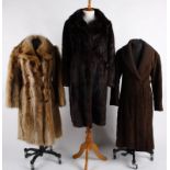 A Gucci 1970s suede coat. An Aquascutum coat, a quantity of coats together with four Vintage fur