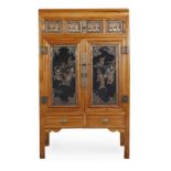 A Chinese black lacquer and gilt decorated cupboard, 20th century, the moulded frieze above three