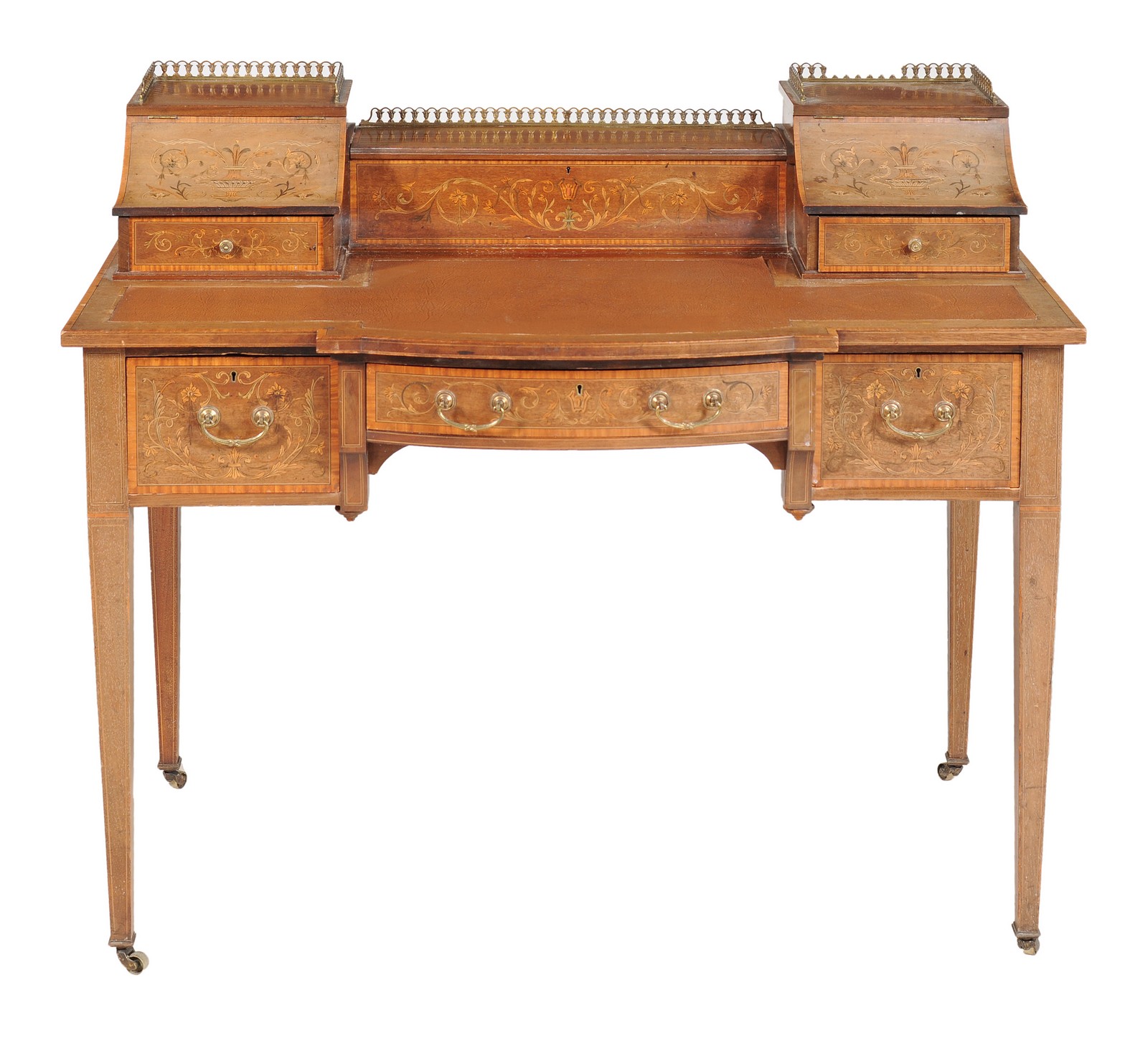 An Edwardian Carlton House desk, circa 1905, with inlaid decoration, the raised back with stationery