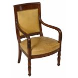 A French Empire period mahogany and upholstered open armchair, circa 1830, with rectangular padded