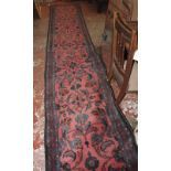 A North West Persian runner 82 x 467cm