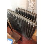 Two cast iron radiators, together with a porcelain and gilt decorated lamp (sold as parts)Best Bid